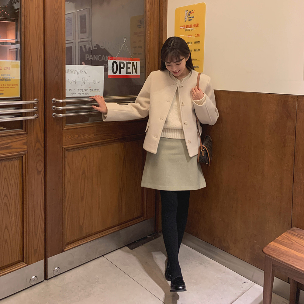 마들렌 버튼 스커트